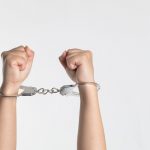 person showing handcuff